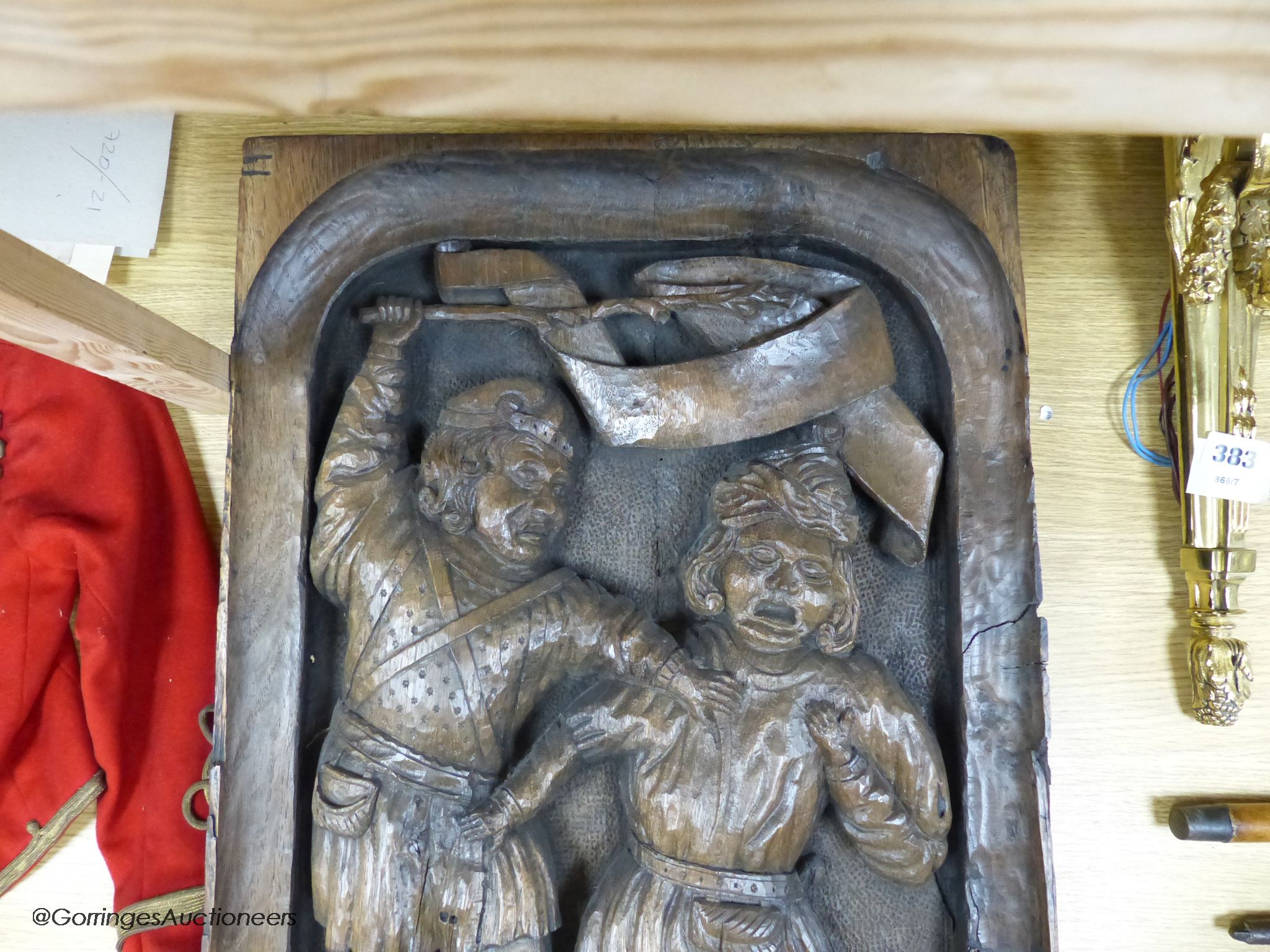 A 16th / 17th century carved oak panel